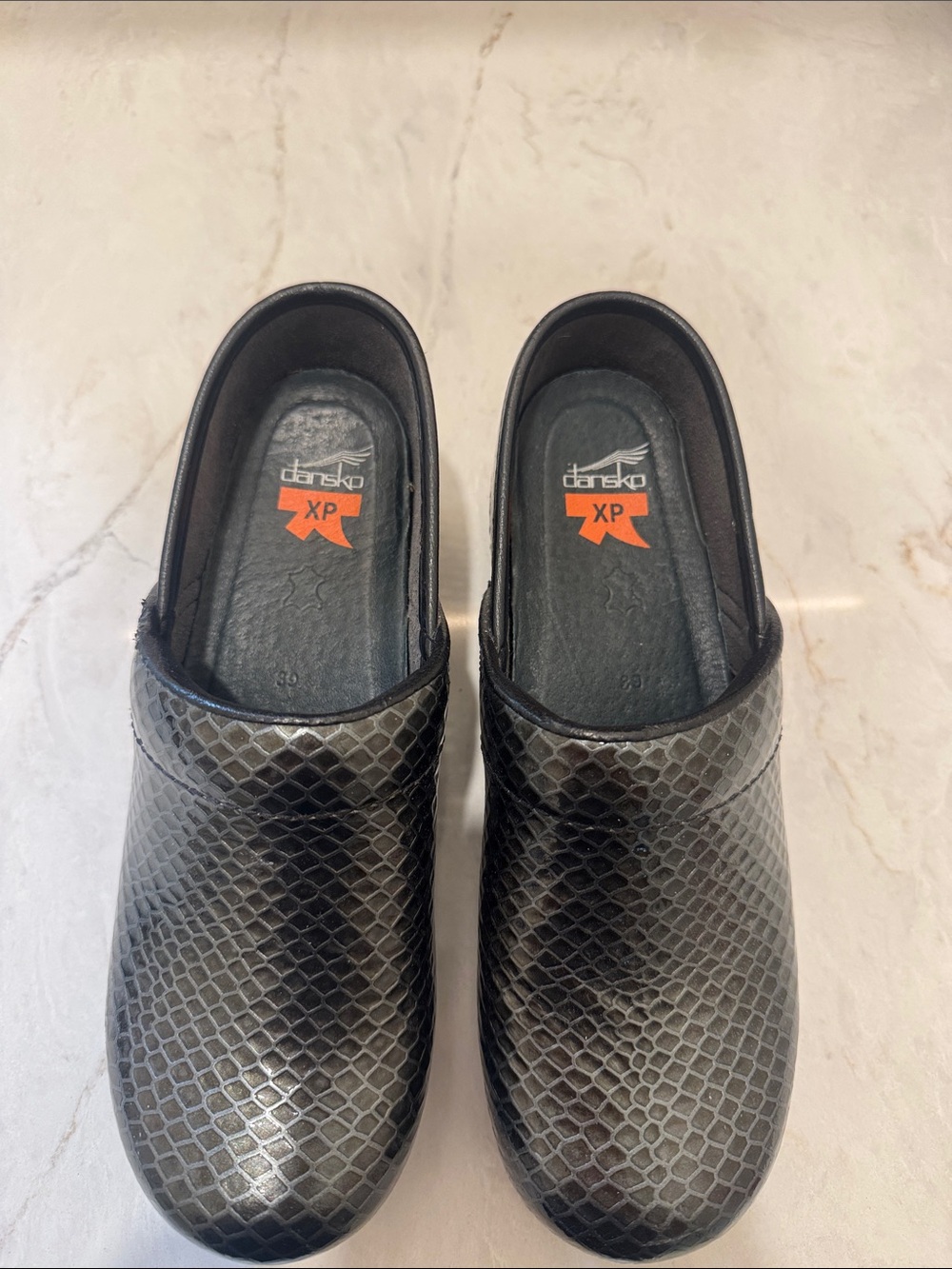 Dansko Men's Black Textured Slip-On Clogs